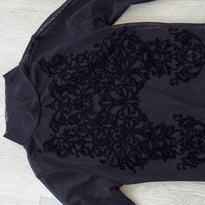 Sheer black Ayanapa bodysuit.